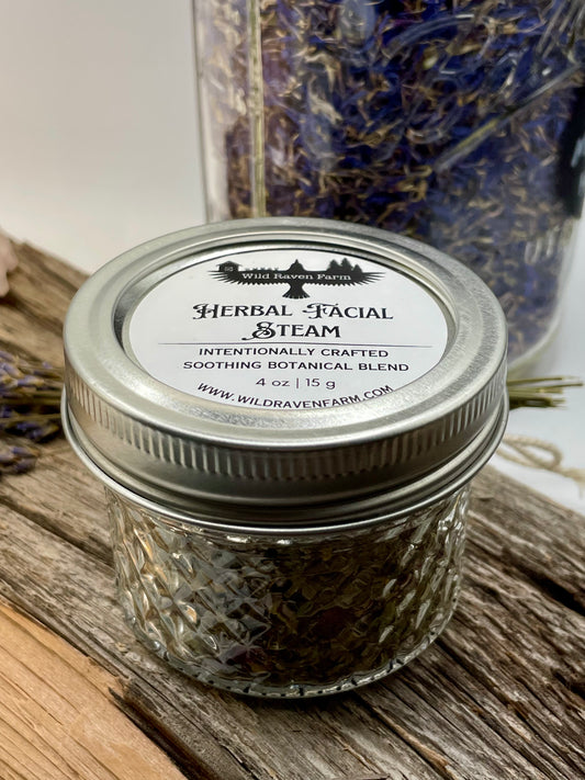 Jar of Herbal Facial Steam with a label on a wooden surface