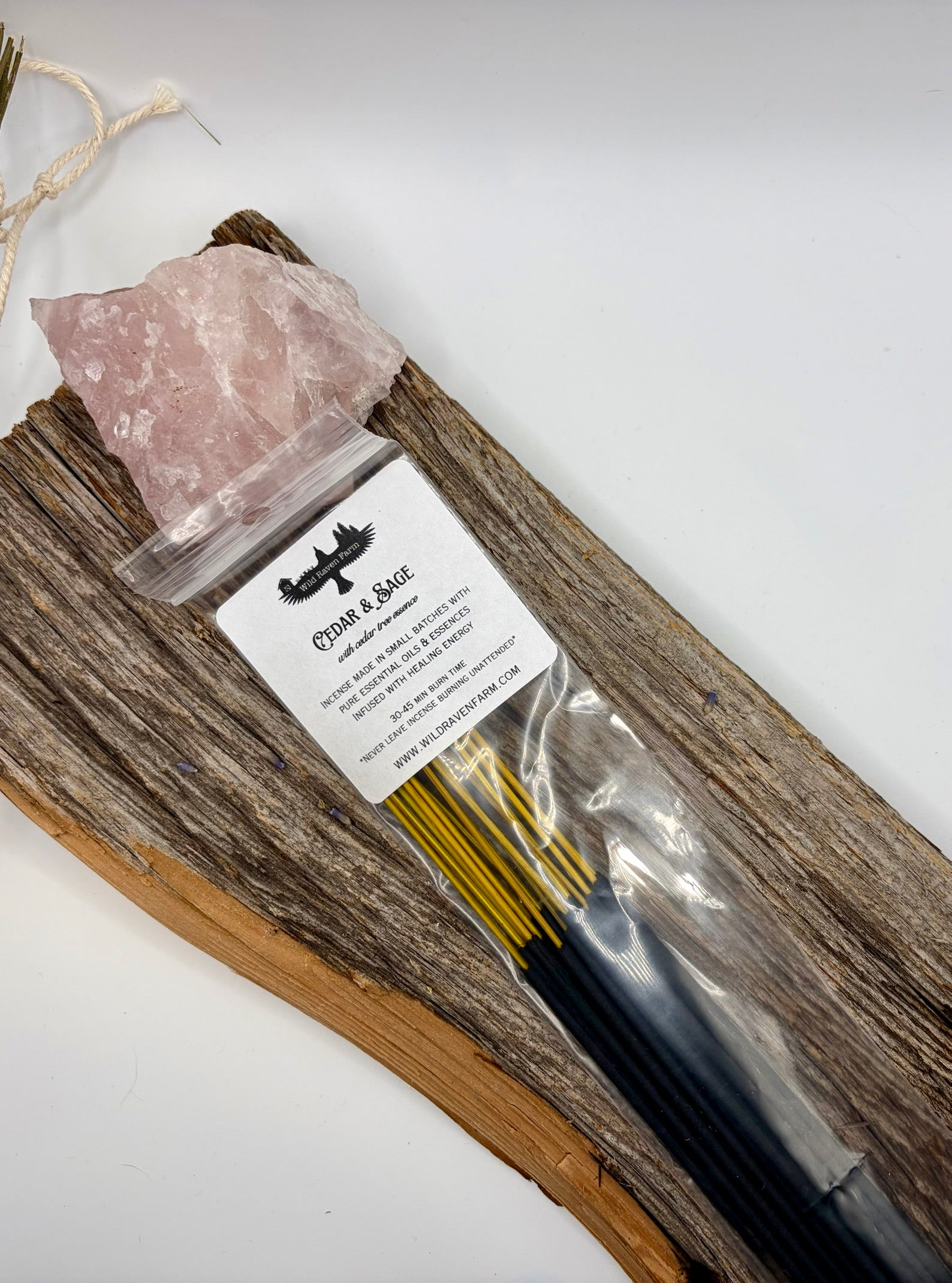 Set of incense in clear plastic packaging on a white background