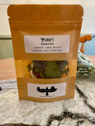 pouch of herbs labeled simmer pot